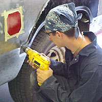 Student adds a patch to a vehicle